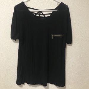 Black top with golden zipper front pocket